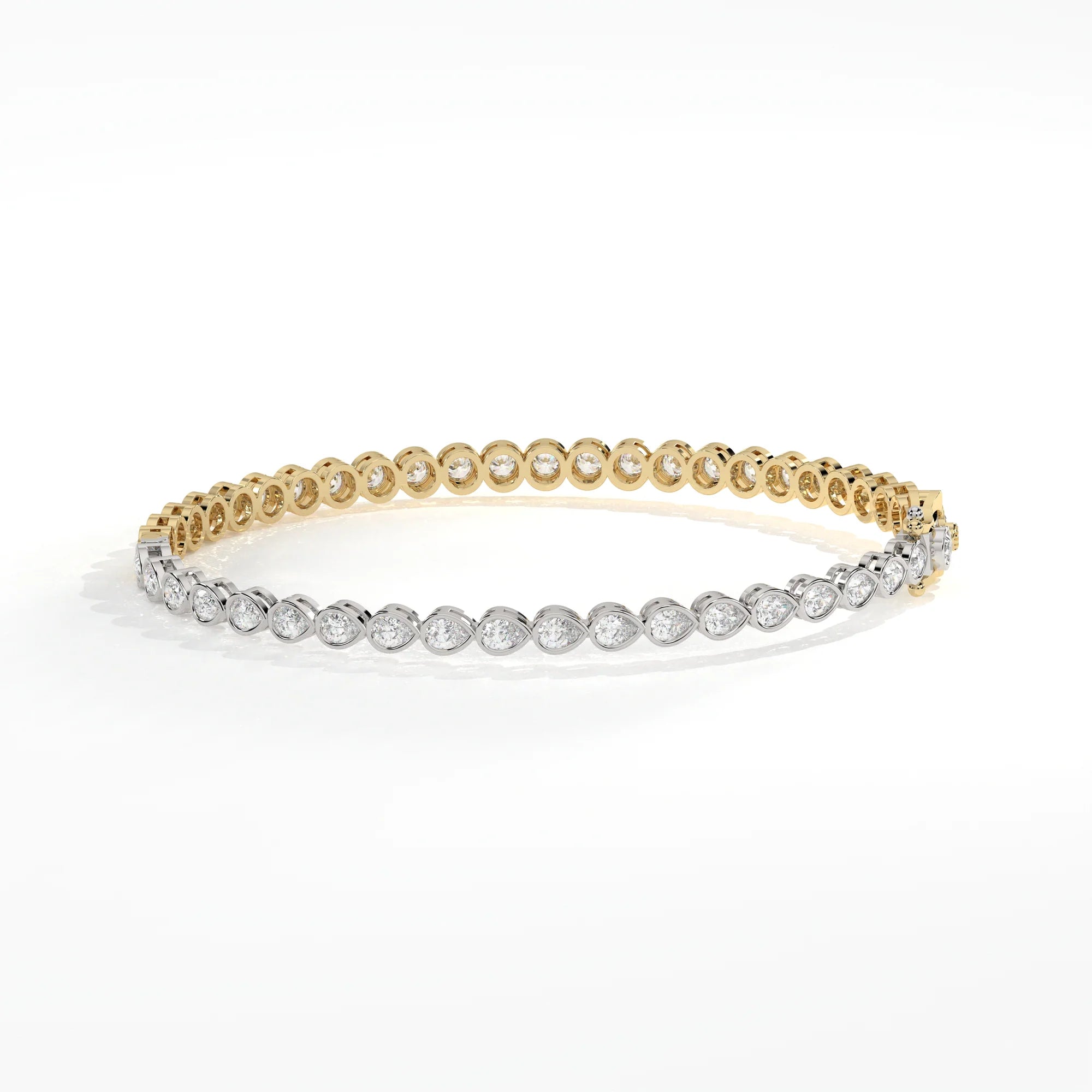 A slim bracelet that is half rose gold with round-cut diamonds, half on white gold with pear-cut diamonds, all bezel set, on a white background