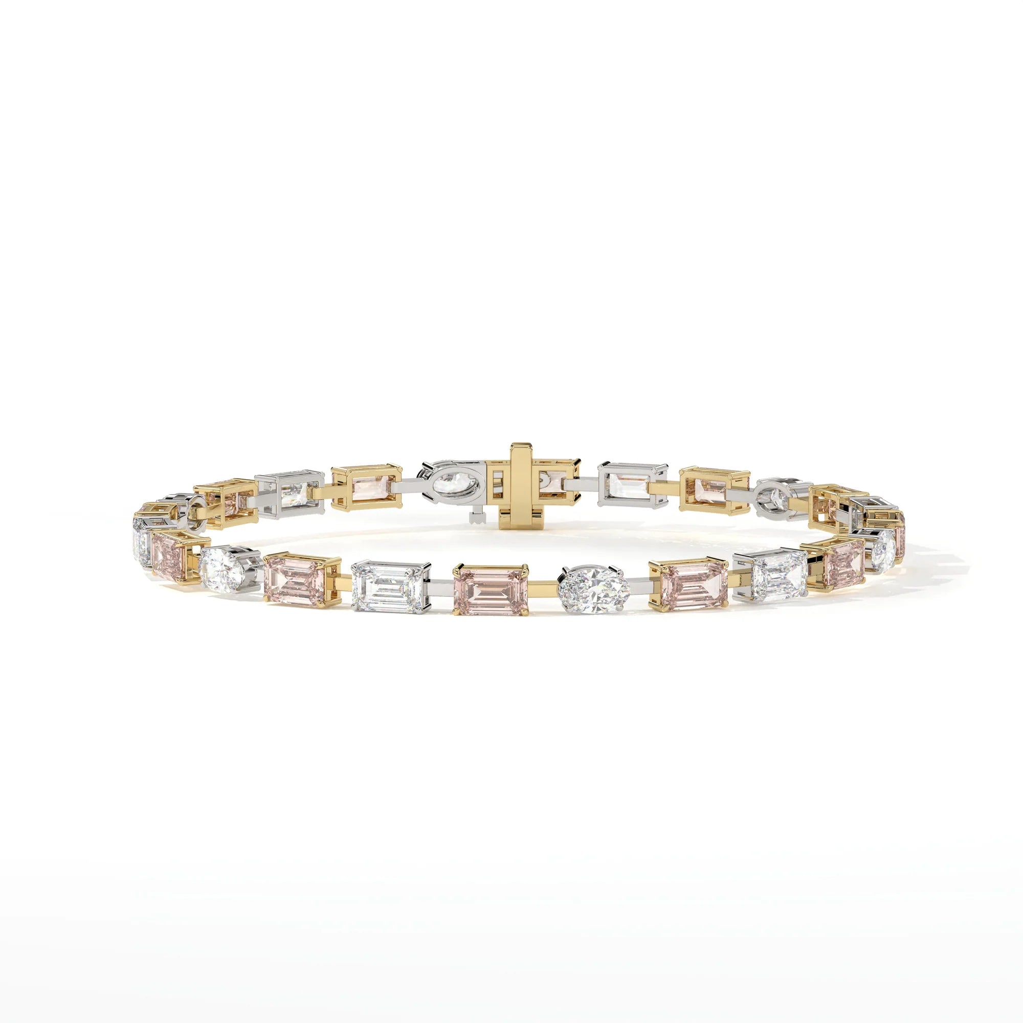 Gold and white gold tennis bracelet with diamonds alternating between oval-cut diamond, east-west emerald-cut pink diamond, east-west emerald-cut diamond, east-west emerald-cut pink diamond, repeating. The clasp is gold.